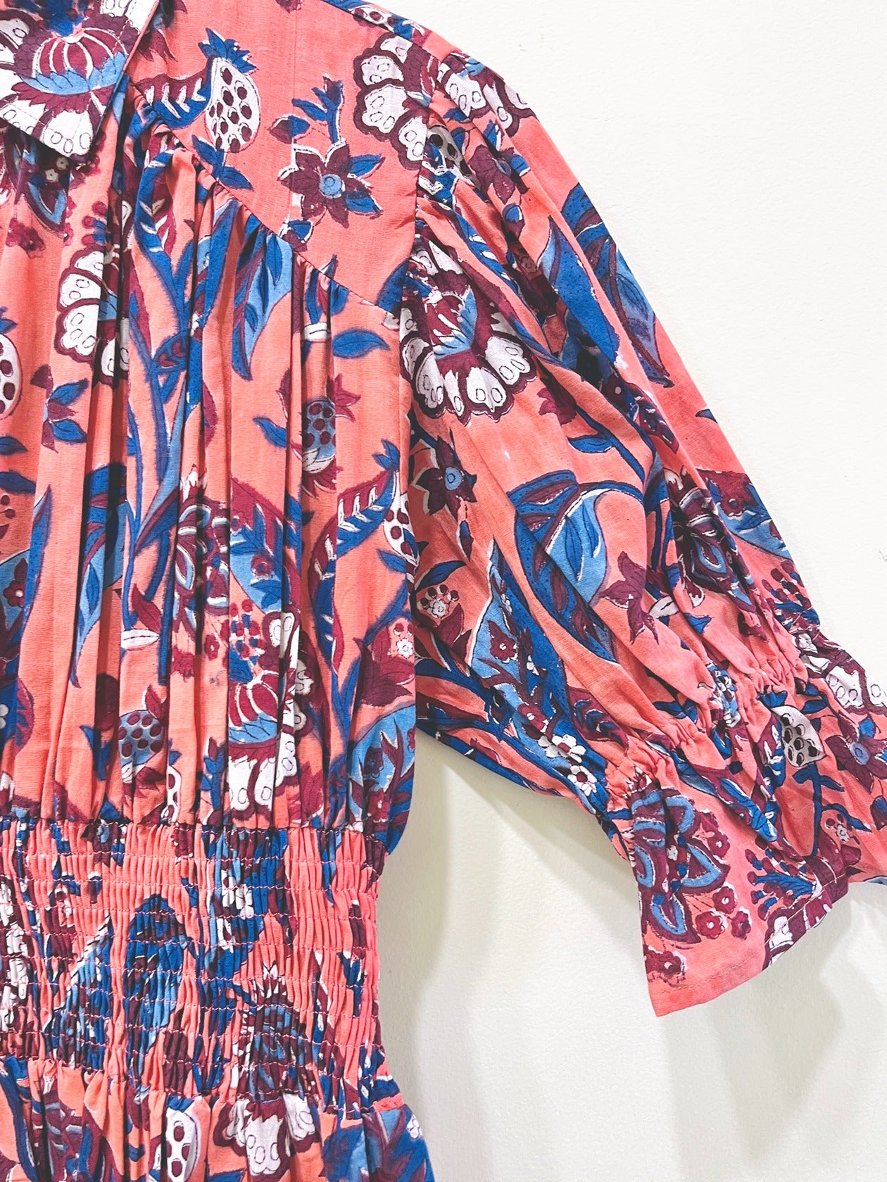 Coral Garden Smocked Peplum Top